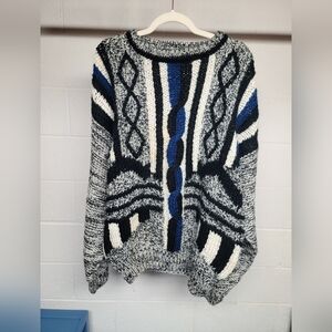 vintage 80s or 90s geometric knit sweater with cable and abstract patterns